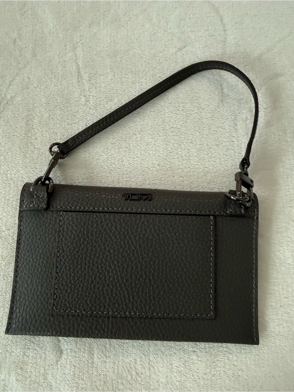 TUMI leather wristlet wallet premium textured pebbled leather gunmetal hardware